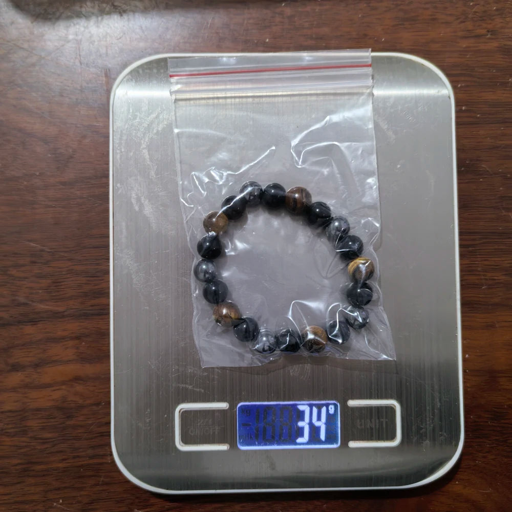 Bracelet en perles d'œil de tigre, obsidienne et hématite